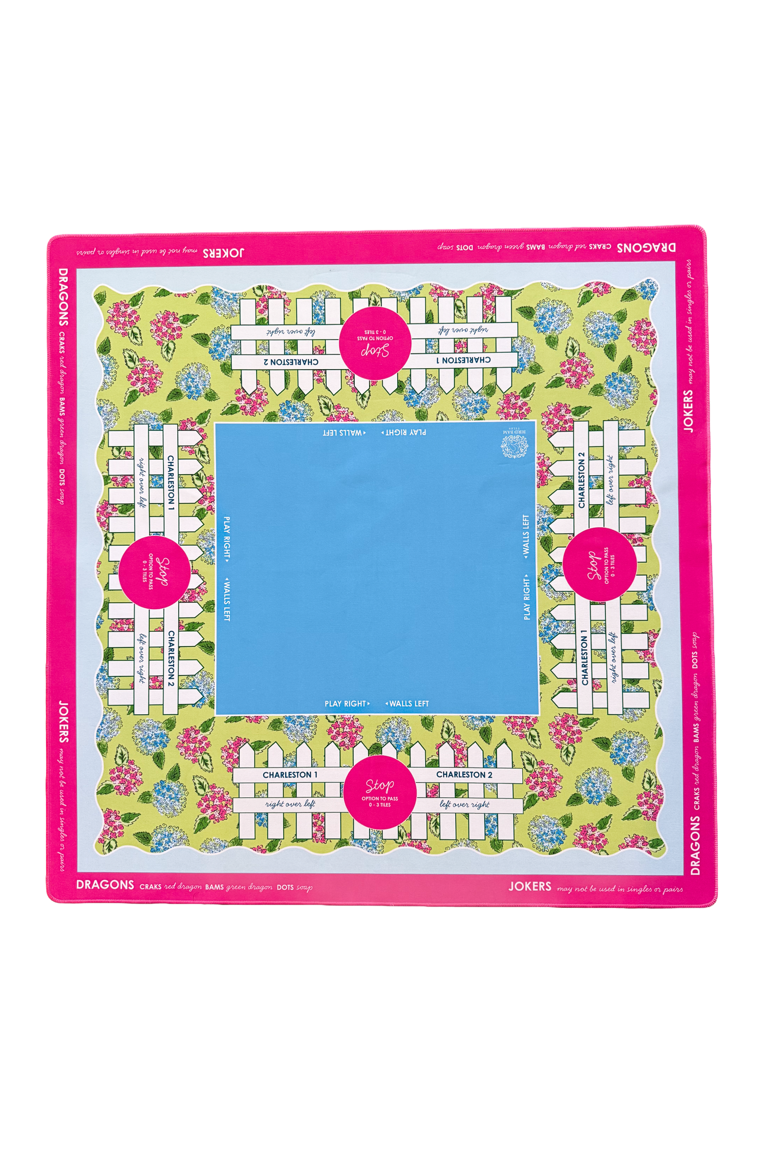 Colorful American Mahjong mat with pink border, blue center, and flowers across the mat