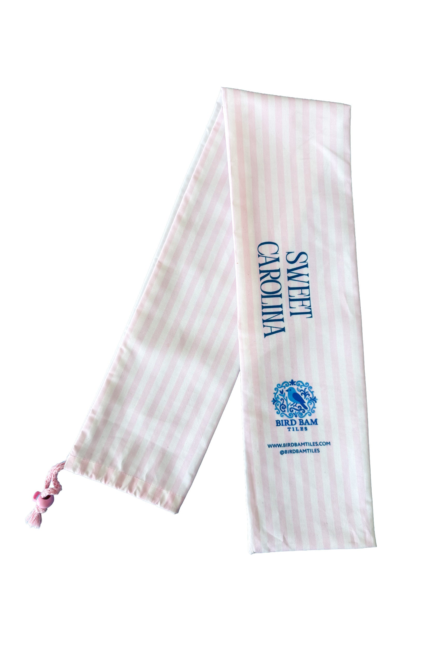 Light pink and white striped bag with Sweet Carolina and Bird Bam Tiles printed on it.